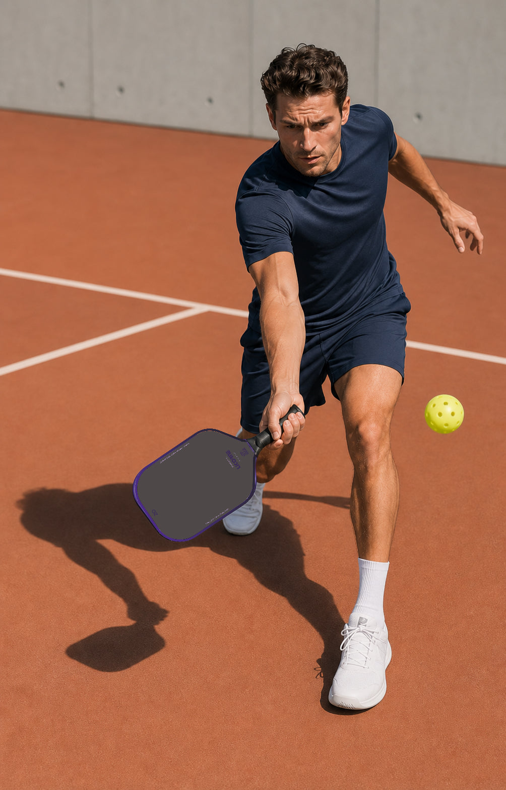 Pickleball player reaching forward on an orange court